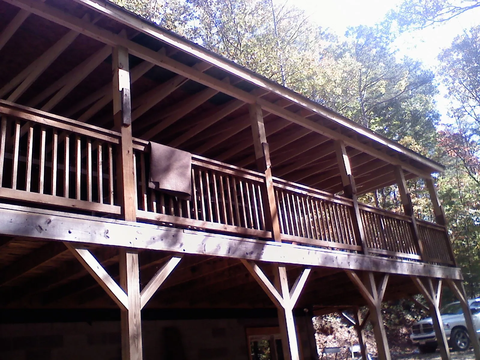 Timber framing under a new elevated porch and deck — Roof Leak Repair in Tooele by Roofing Brothers